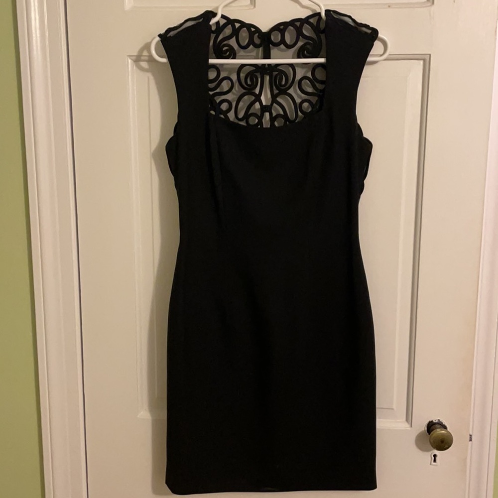 Laundry black short dress with lace back design.